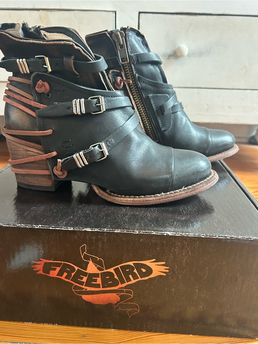 Freebird Black Leather Ankle Boots with red Straps and feminine buckles Detail.